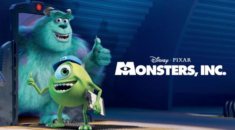 Disney and Pixar’s Monsters, Inc. promotional banner, featuring the two main characters, James P. "Sulley" Sullivan and Mike Wazowski, standing on a scare floor next to a metallic door frame.
