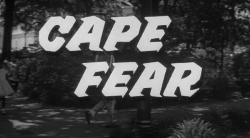 Black-and-white outdoor scene with trees and grass, overlaid with large bold text reading “CAPE FEAR” across the center.