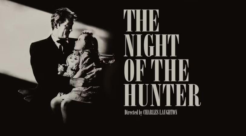 Black-and-white film poster showing a man holding a woman in a dark setting, with large title text reading “THE NIGHT OF THE HUNTER” and smaller text “Directed by Charles Laughton”.